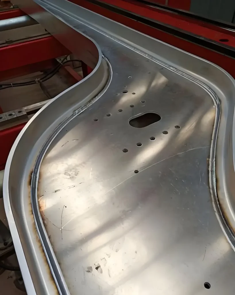 Robotic MIG welding of aluminum frame assembly in a China factory